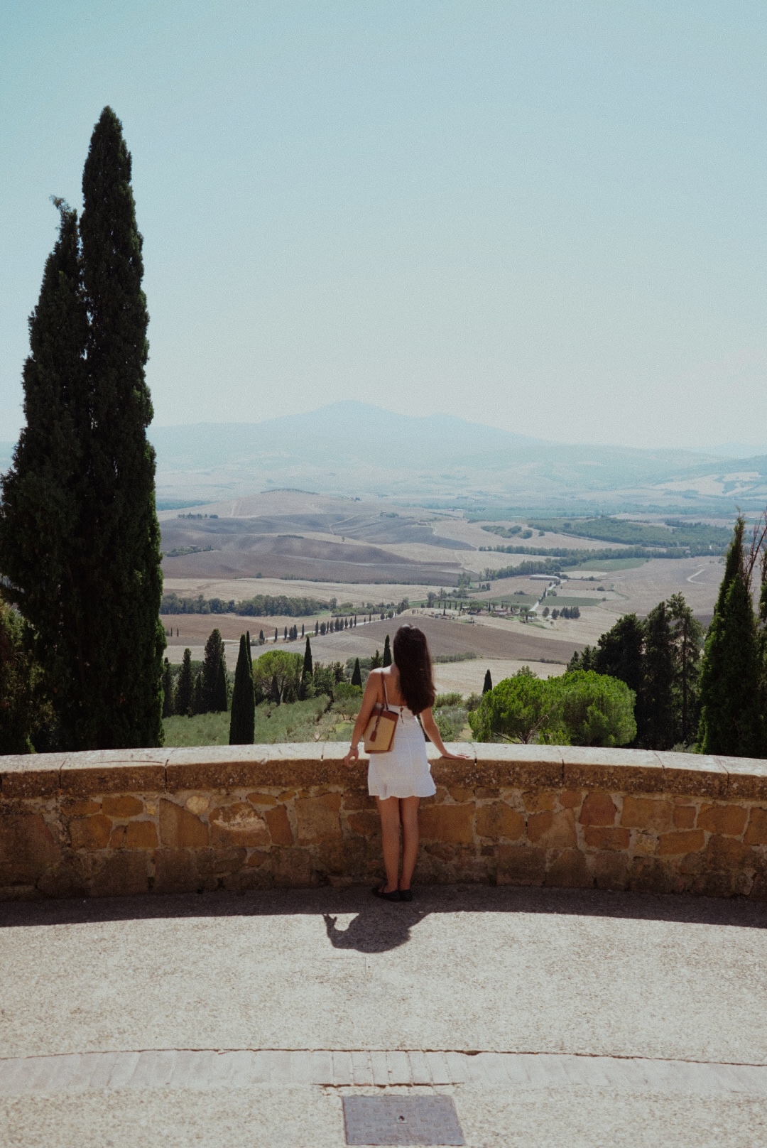 The iconic rolling hills and cypress trees of the Val d'Orcia region, Pienza, Tuscany